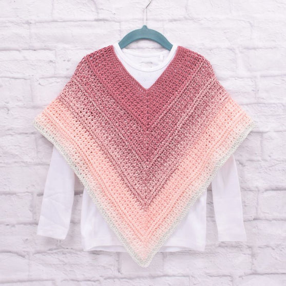 Poncho Enfant Timeless – Twister
5