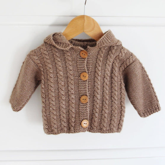 Gilet à torsades avec capuche - Baby
3