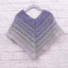 

Classical Attitude Poncho – Enfant
4