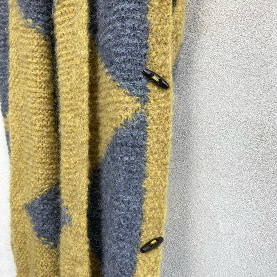 

Fringy - Châle Enveloppant
7