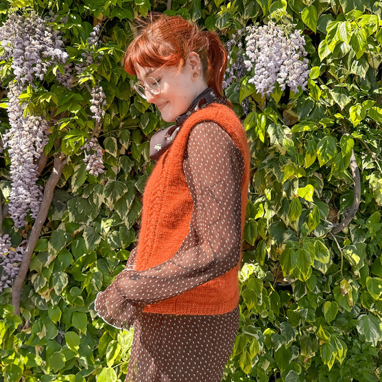 

Tanjun - Pull sans manches
3